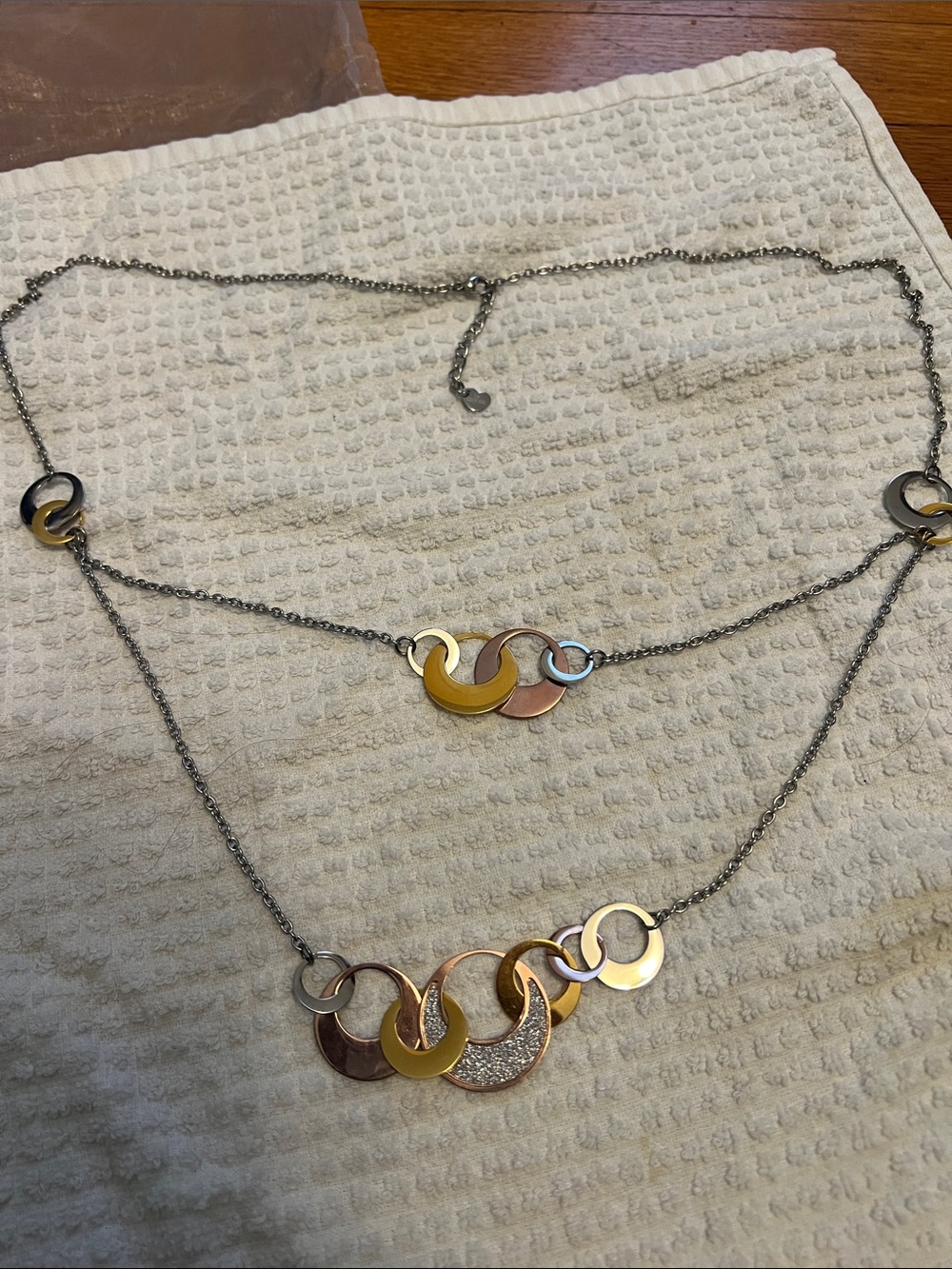 QVC Multi-Tone Interlocking Circle Pendant Necklace in stainless steel